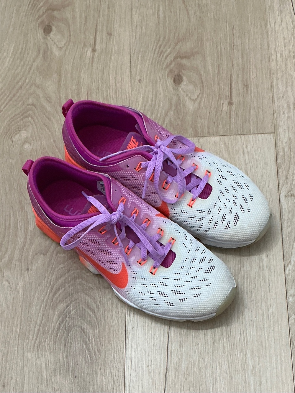 Nike Womens Zoom Fit White Sneakers with Purple Trim and Orange Swoosh